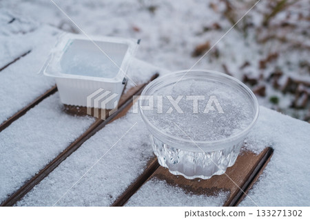 Ice in a container on the balcony 133271302