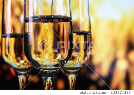 sparkling champagne ambiance captured beautifully, reflections and bubbles enhance luxurious mood of event sparkling champagne ambiance captured beautifully, reflections and bubbles enhance luxurious mood of event 133271321