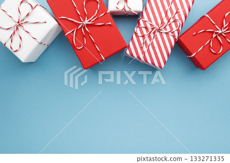 Gift boxes on color background, flat lay, space for text Gift boxes on color background, flat lay, space for text 133271335
