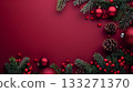 A red background with a Christmas tree and red ornaments, pine cones and red berries. Copy space 133271370