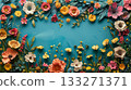 A blue background with a flowery border. The flowers are in various colors and sizes. Concept of beauty and tranquility 133271371