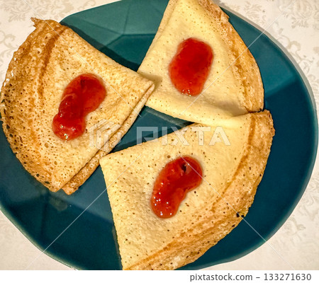 Pancakes With Strawberry Jam On Blue Plate 133271630