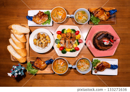 A gorgeous table with Christmas chicken, fried chicken wreaths, and cake A gorgeous table with Christmas chicken, fried chicken wreaths, and cake 133271636