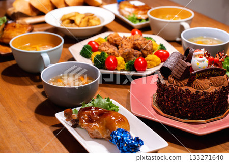 A gorgeous table with Christmas chicken, fried chicken wreaths, and cake A gorgeous table with Christmas chicken, fried chicken wreaths, and cake 133271640