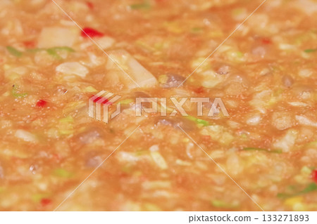 Cooking monjayaki on a hot plate Cooking monjayaki on a hot plate 133271893