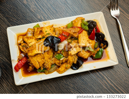Stewed tofu with vegetables on a plate Stewed tofu with vegetables on a plate 133273022