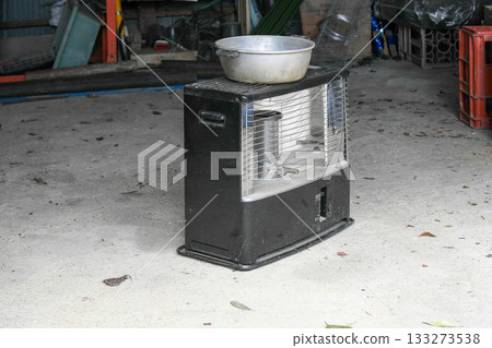 Kerosene stove in the work shed Kerosene stove in the work shed 133273538