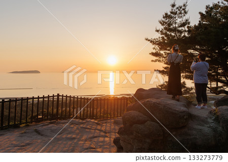 Zenigata sand painting (Kan'ei Tsūhō coin) seen at dusk from the Zenigata Observatory 133273779