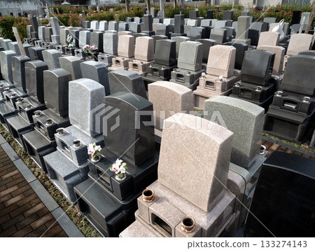 Gravestones lined up in the cemetery Gravestones lined up in the cemetery 133274143