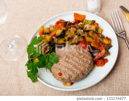 Hamburger with vegetables with stewed vegetables 133274877