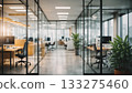 A modern office with impressive glass and natural light. A clean and business-like workplace used as a corporate workspace. 133275460
