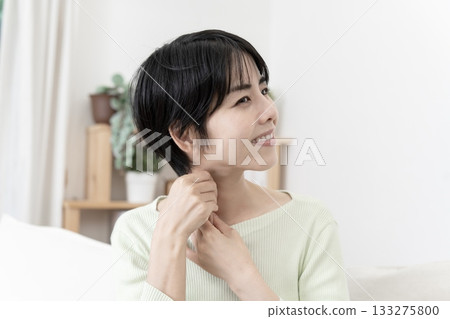 Woman massaging her neck - Sternocleidomastoid method - Face-slimming massage 133275800