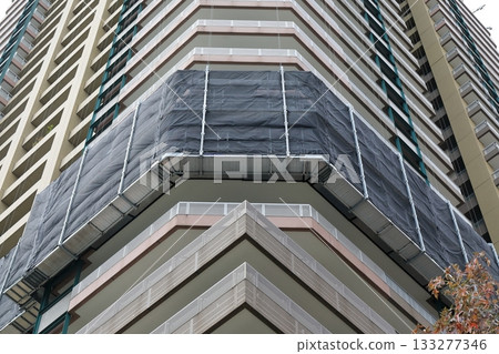 Tower apartment building undergoing repairs Tower apartment building undergoing repairs 133277346