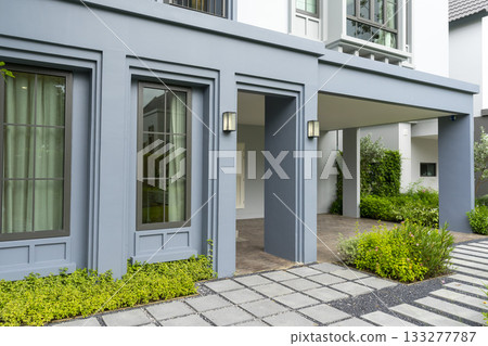 Design of landscaping of home garden backyard with brick walkway in summer. 133277787