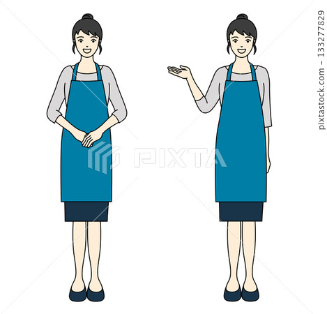 一位身穿藍色圍裙和裙子的女士全身像,面帶微笑,鞠躬或指路。 一位身穿藍色圍裙和裙子的女士全身像,面帶微笑,鞠躬或指路。 133277829