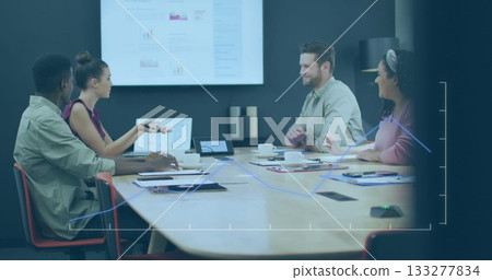 Business team analyzing sales data on chart display in meeting room, with reports and coffee cups Business team analyzing sales data on chart display in meeting room, with reports and coffee cups 133277834