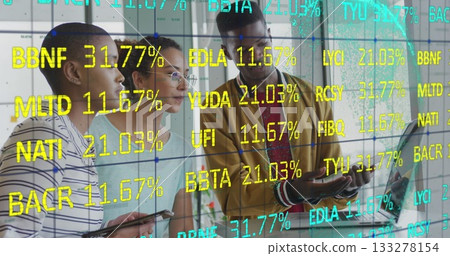 Three professionals reviewing financial data on glass wall in office, with smartphones and tablet Three professionals reviewing financial data on glass wall in office, with smartphones and tablet 133278154
