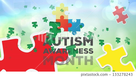 Showing AUTISM AWARENESS MONTH on gradient with red, yellow and multicolor puzzles, green fragments 133278243
