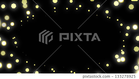 Forming glowing yellow hexagonal ring around central void in abstract scene, with light dots 133278925