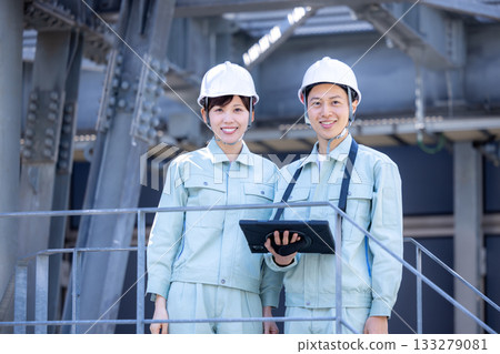 Workers working at a construction site. Photo courtesy of Denpa Gakuen, Tokyo Electronics College. 133279081