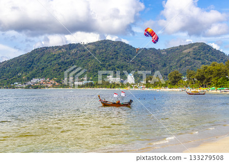 Longtail boat long tail boats at the Patong Beach Thailand. 133279508