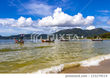 Longtail boat long tail boats at the Patong Beach Thailand. 133279514