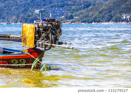 Longtail boat long tail boats at the Patong Beach Thailand. Longtail boat long tail boats at the Patong Beach Thailand. 133279527