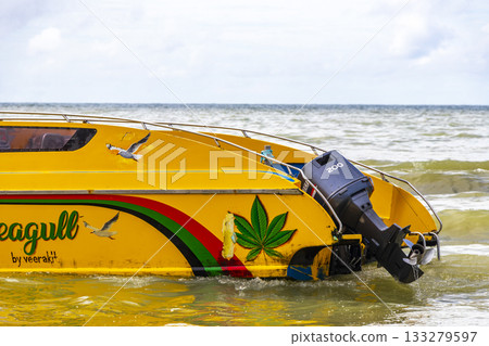 Speed boat yacht boats turquoise blue water Patong Beach Thailand. 133279597