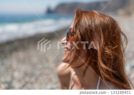 Woman smiling beach summer vacation travel copy space 133280451