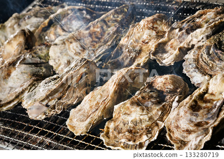 Charcoal grilled oysters 133280719