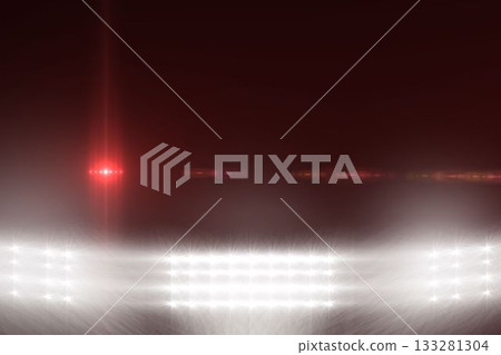 Stadium floodlights are casting beams into dark sky showing red lens flare in flat design Stadium floodlights are casting beams into dark sky showing red lens flare in flat design 133281304