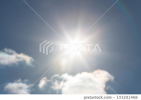 Low angle view of sky with glowing sun 133281466