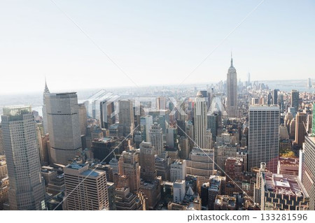 Flat design showing Manhattan towers by Empire State building, highlighting rooftop water towers Flat design showing Manhattan towers by Empire State building, highlighting rooftop water towers 133281596