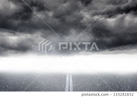 Flat design showing empty asphalt road with faded center line leading into fog under storm clouds Flat design showing empty asphalt road with faded center line leading into fog under storm clouds 133281652
