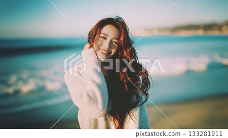 A woman standing on the coast 133281911