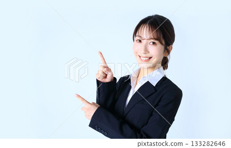 Image of business woman putting out index finger 133282646