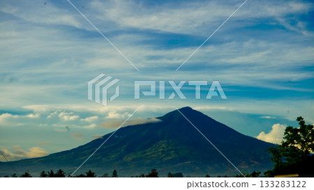 beautiful view of tropical rainforest shrouded in mist 133283122