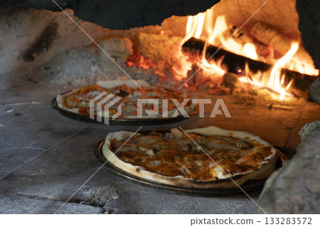 Kiln-grilled pizza Kiln-grilled pizza 133283572