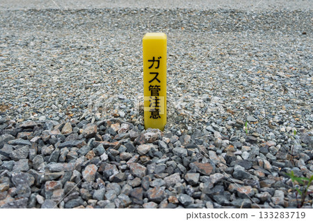 Underground facilities that support life in Japan: Yellow gas pipe warning signs 133283719