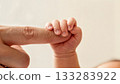 Newborn Baby Hand Gripping Parent Finger Trust Bond 133283922