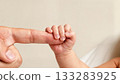 Newborn Baby Hand Gripping Parent Finger Trust Bond 133283925