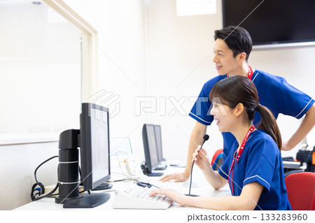 A radiologist looks at the results of a CT scan on a monitor. Photo courtesy of Denpa Gakuen, Tokyo Electronics College. A radiologist looks at the results of a CT scan on a monitor. Photo courtesy of Denpa Gakuen, Tokyo Electronics College. 133283960