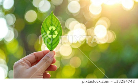 AI image: Green leaf with a recycling symbol 133284748