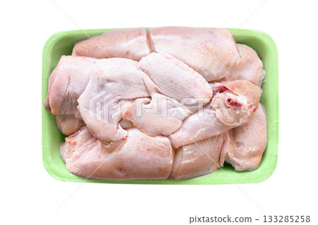 Raw whole chicken cut on a foam meat tray. 133285258