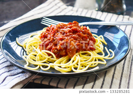 Spaghetti Bolognese on a plate. Spaghetti Bolognese on a plate. 133285281