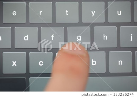 Finger typing on touchscreen keyboard 133286274