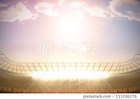 Large football stadium under bright blue sky 133286276