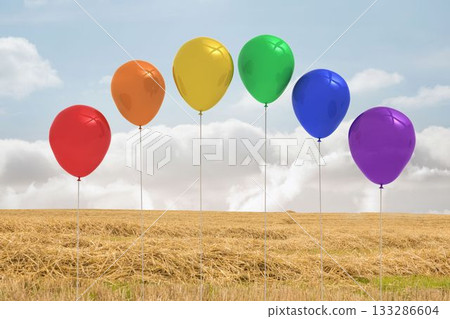 Six colorful balloons are standing in flat design harvested straw field with cloudy sky 133286604