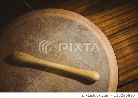 Close-up of wooden bodhran with stick Close-up of wooden bodhran with stick 133286680