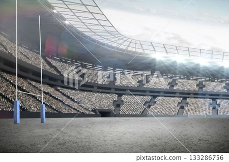 Pair of white goalposts is standing in flat stadium scene with floodlights on, grandstand overhead Pair of white goalposts is standing in flat stadium scene with floodlights on, grandstand overhead 133286756